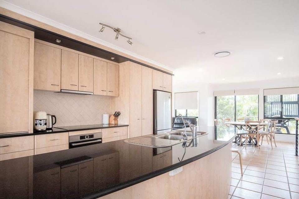 Fully equipped kitchen with ample counter space.