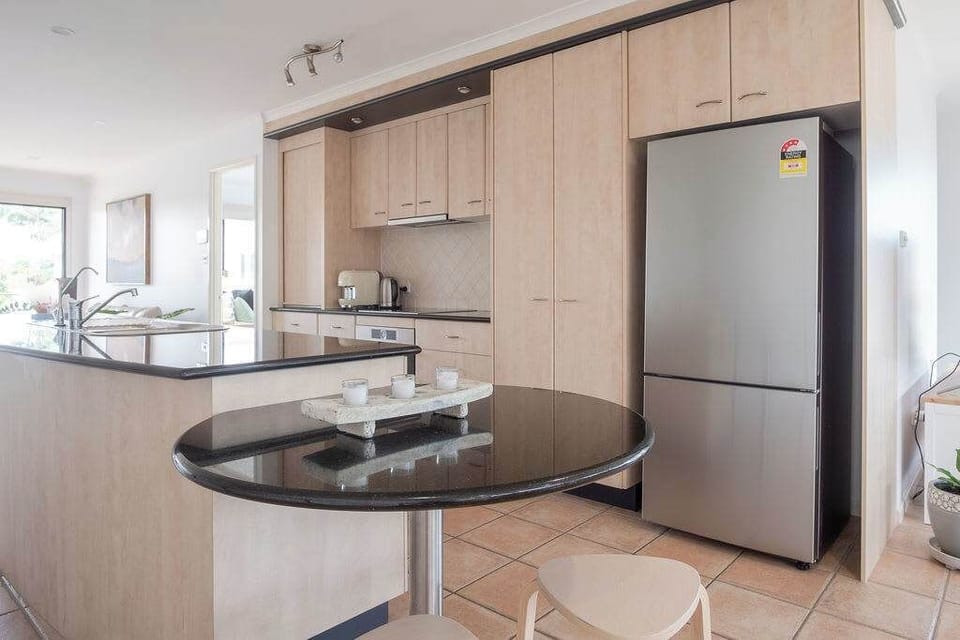 Small table right by the kitchen.