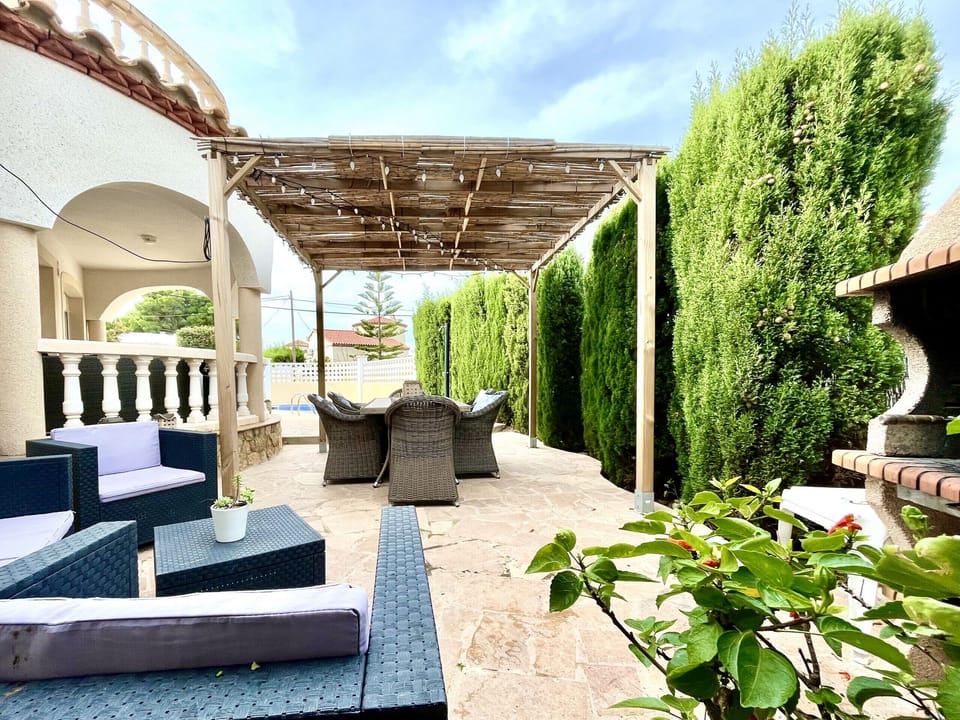 Chill out area next to the barbacue and outdoor dinning table