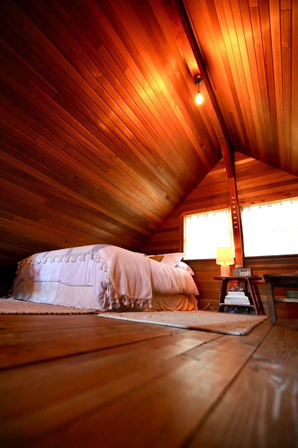 Enjoy the warm light and cedar wood siding 