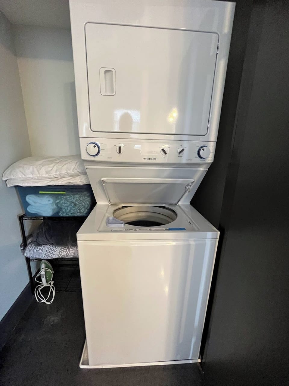 Laundry area with washer and dryer for guest use