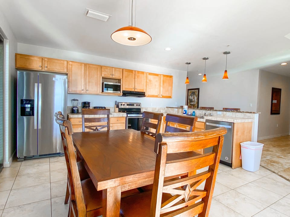 Working remotely? Set up your laptop & enjoy the beach views! This table has plenty of room!