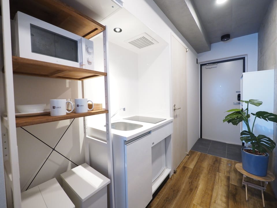 Mini-fridge, microwave, stovetop, electric kettle