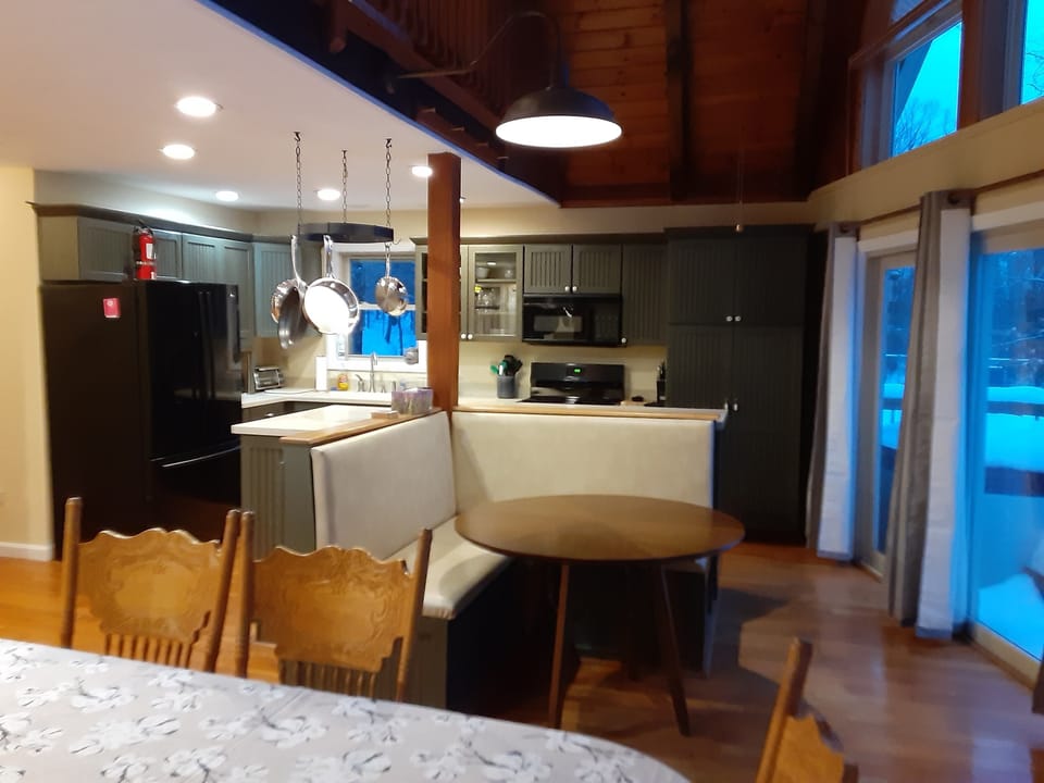 Kitchen.. view of the galley and bench seats/table