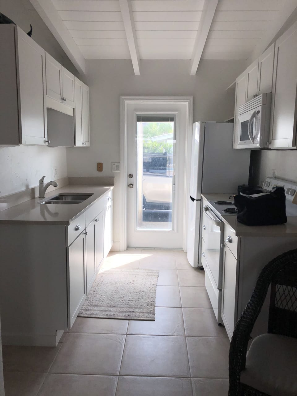 Parking side door, Kitchen.