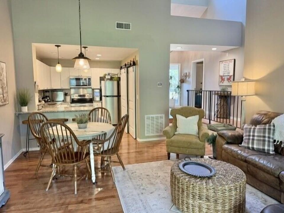 Dining area and kitchen adjacent to the living room.