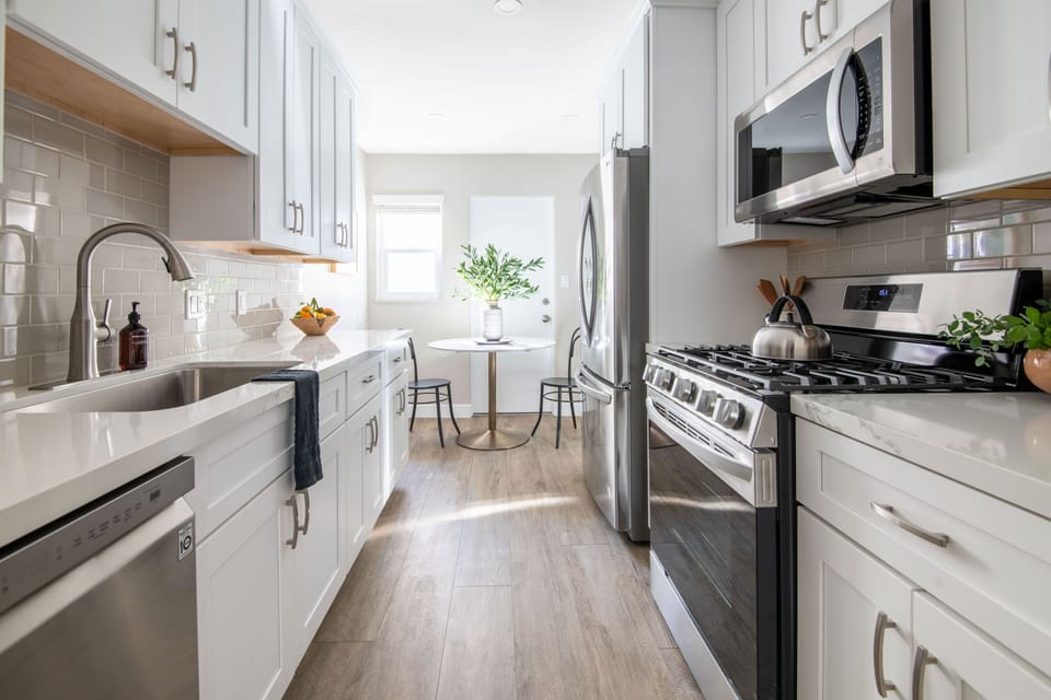 Kitchen features modern applainces.