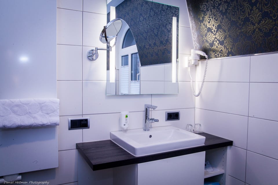 Shower, free toiletries, hair dryer, slippers