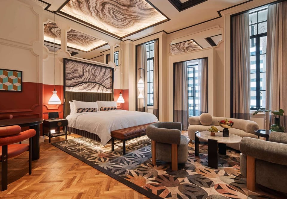 Premium bedding, down comforters, pillowtop beds, minibar