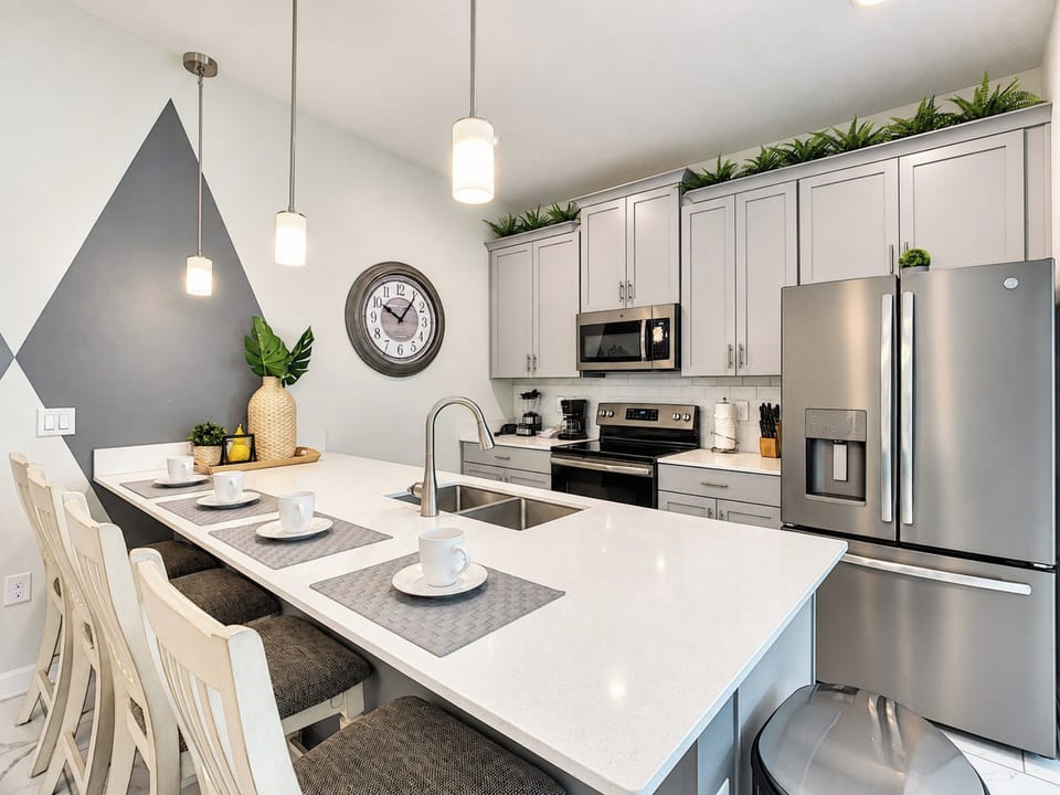 Modern Kitchen with Breakfast Bar and Stainless Steel Appliances