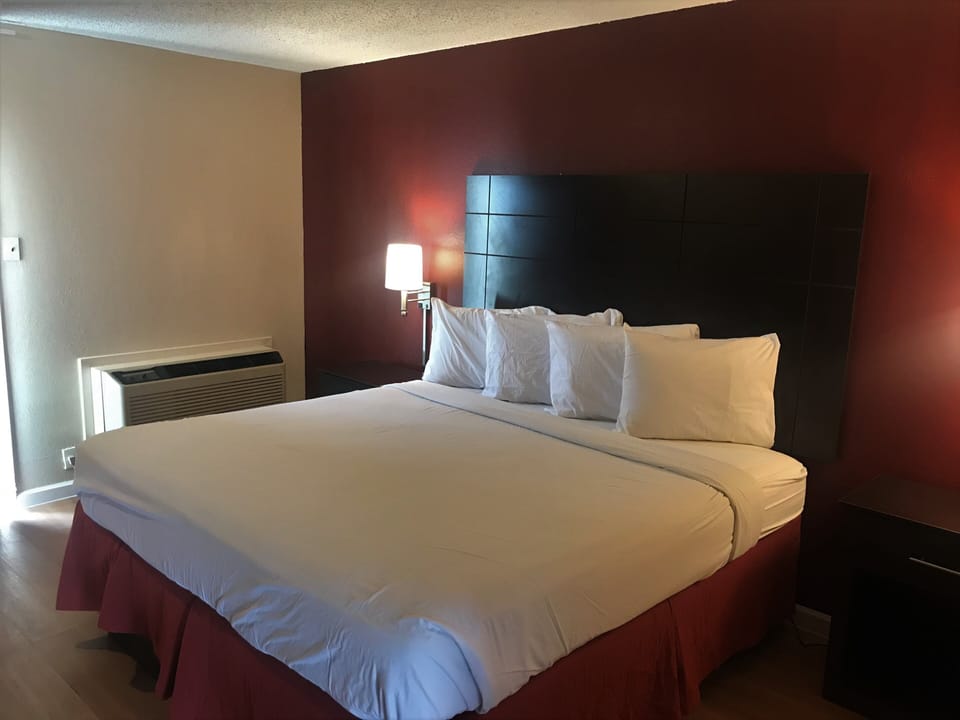 Desk, laptop workspace, blackout drapes, cribs (free)