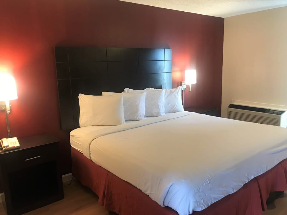 Desk, laptop workspace, blackout drapes, cribs (free)