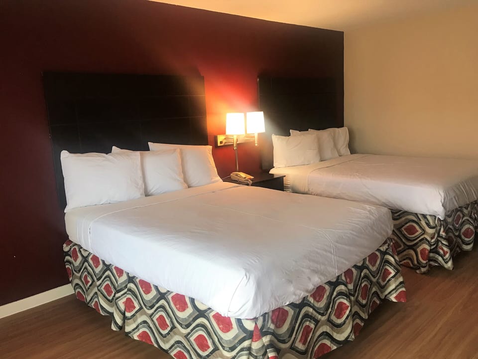 Desk, laptop workspace, blackout drapes, cribs (free)