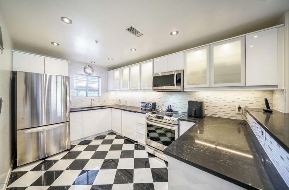 Newly remodeled contemporary kitchen! Quartz countertops with built in microwave