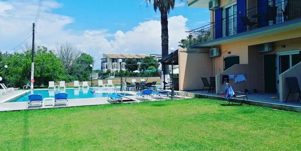 Room, 2 Bedrooms, Terrace, Garden View | Pool | Outdoor pool, sun loungers