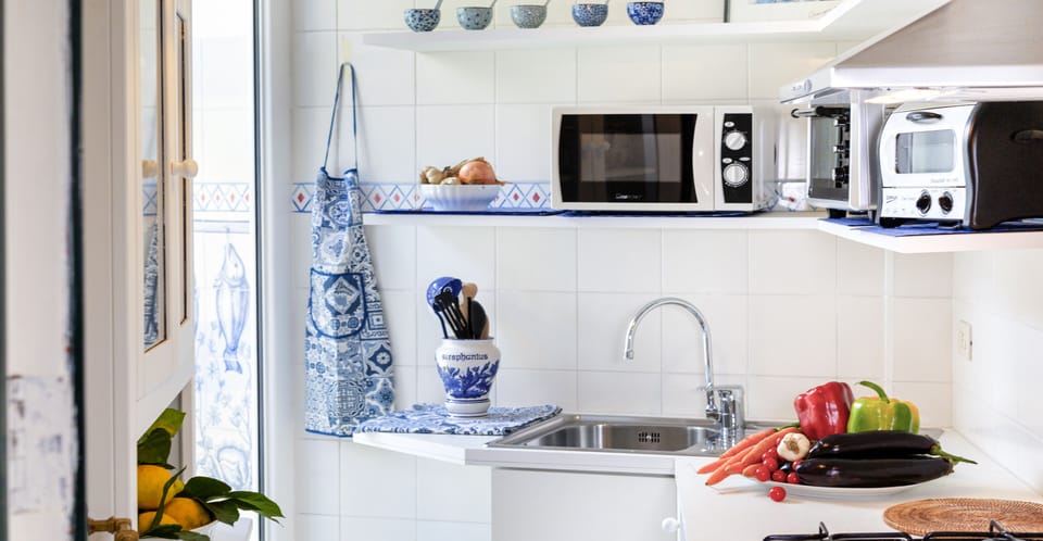 Apartment, 2 Bedrooms, Smoking, Pool Access | Private kitchen | Fridge, stovetop, dishwasher, cookware/dishes/utensils