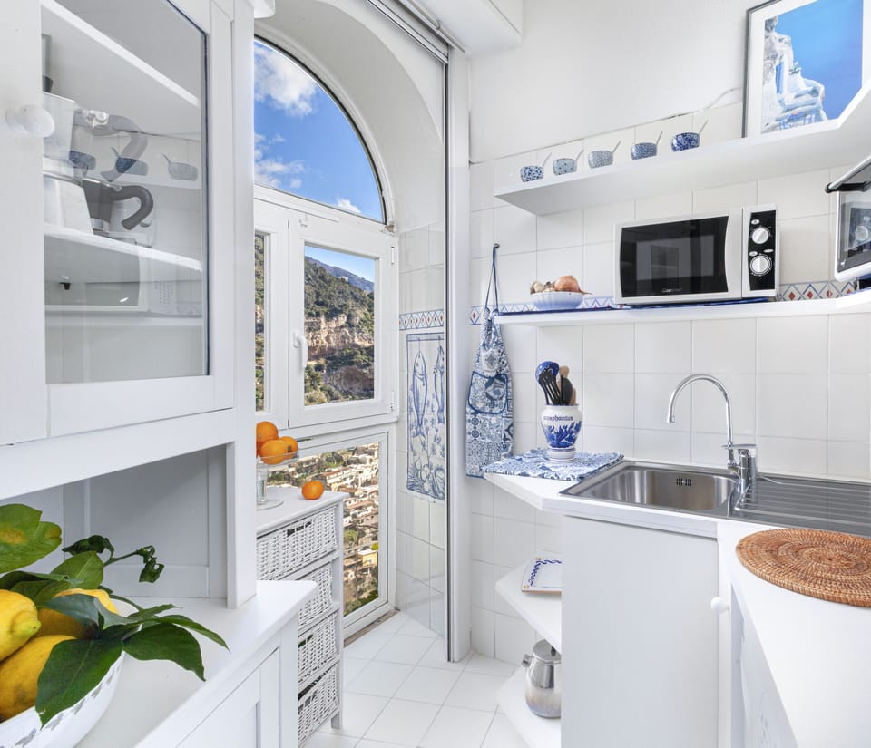 Apartment, 2 Bedrooms, Smoking, Pool Access | Private kitchen | Fridge, stovetop, dishwasher, cookware/dishes/utensils