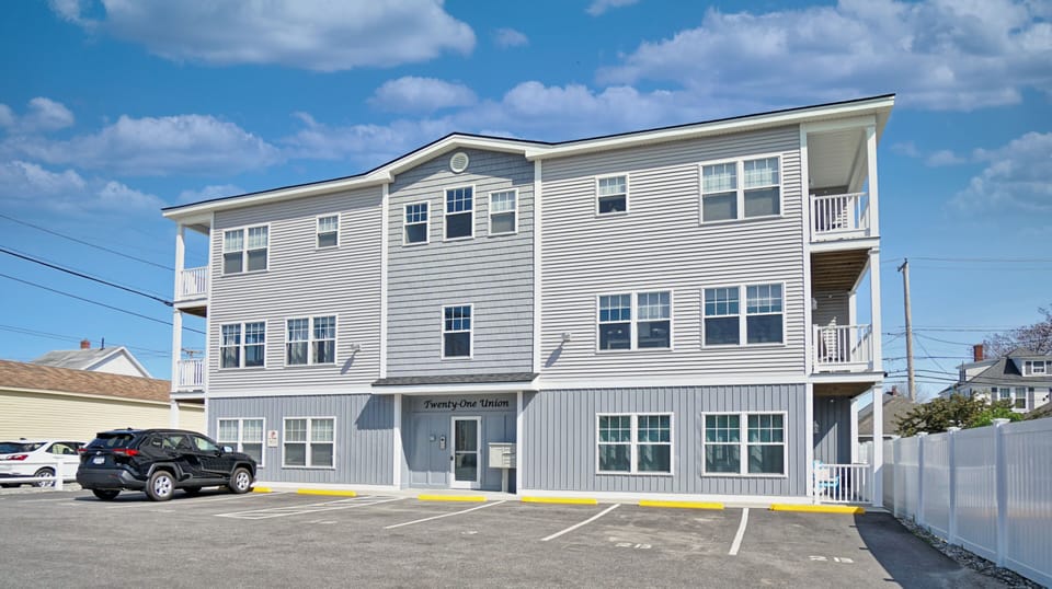 Exterior of property | Designated parking | Entrance to Property