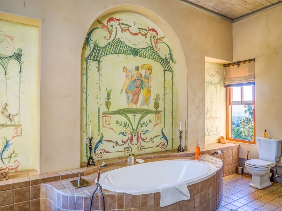 Presidential Suite | Bathroom | Deep soaking tub, free toiletries, hair dryer, bathrobes
