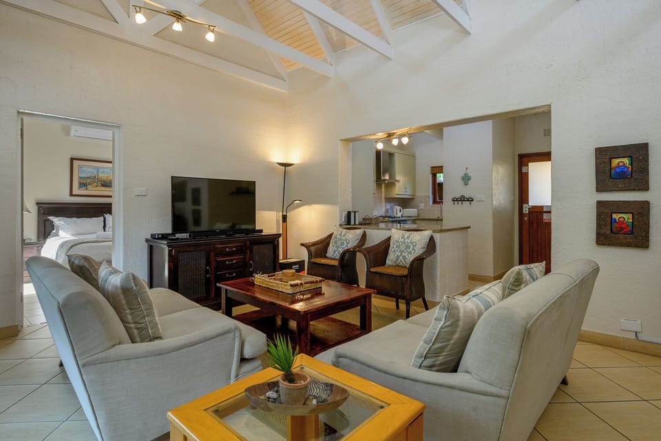 Superior Villa | Living room | Flat-screen TV