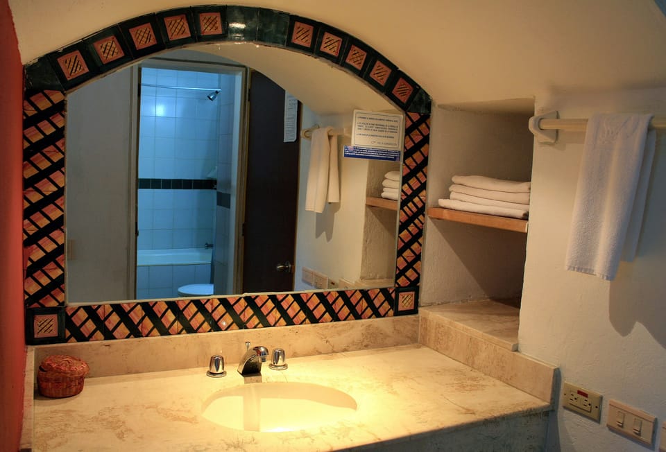 Shower, rainfall showerhead, towels