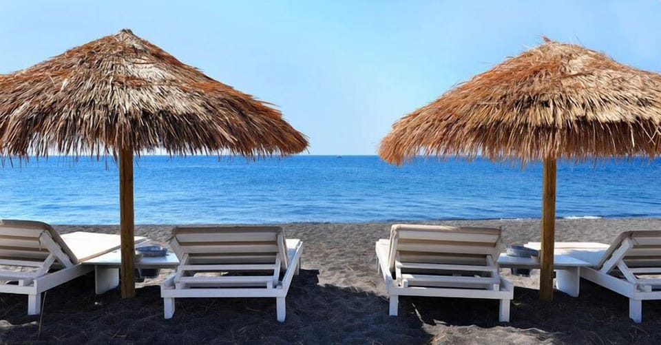 On the beach, black sand