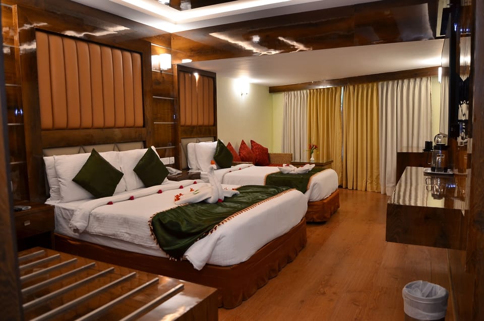 Executive Triple Room | Pillowtop beds, in-room safe, individually decorated