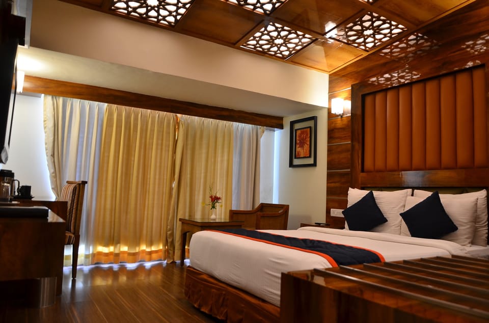 Executive Room | Pillowtop beds, in-room safe, individually decorated