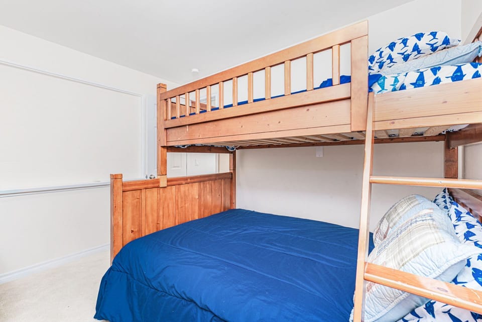 The second bedroom includes a bunk bed (twin size mattress on top; full size mattress on bottom). Carpeting included in the bedrooms and living room.
                