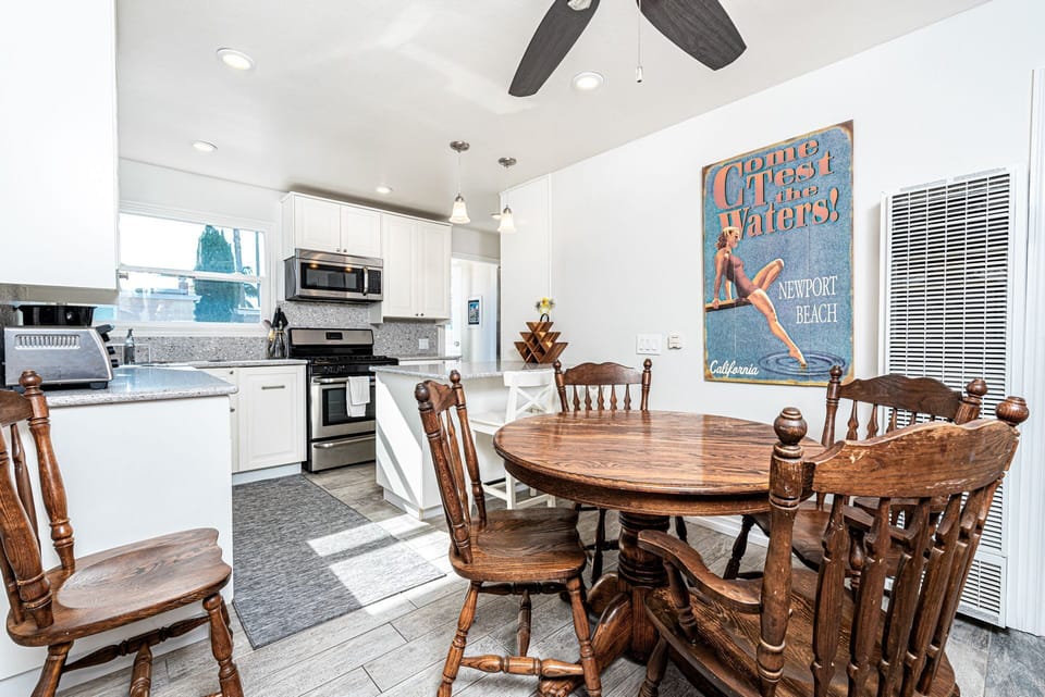 Small, but simply delightful! This upper unit transitions from kitchen, dining, and living room (behind dining table) seamlessly.
                