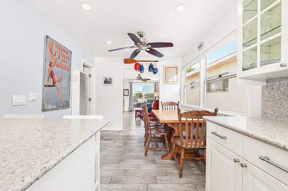 Just behind the dining room table is a bar area with bar stools, so the house chef can cook with an audience!
                
