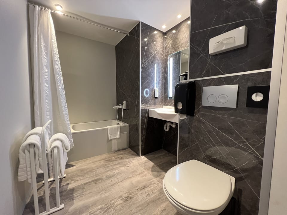 Quadruple Room | Bathroom | Shower, free toiletries, hair dryer, towels