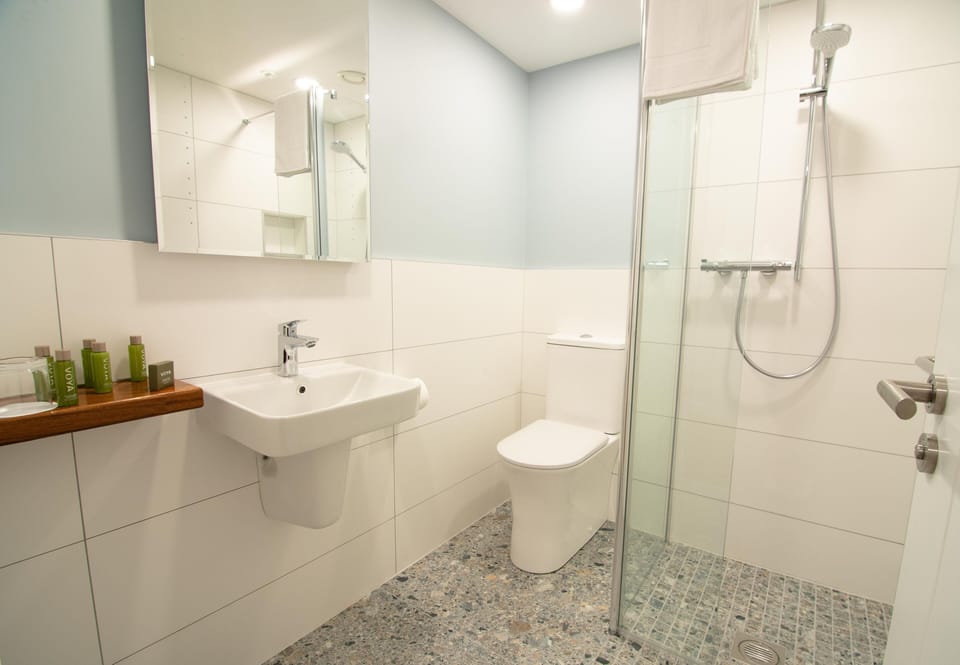 Your En-suite bathroom with high powered shower with a modern twist