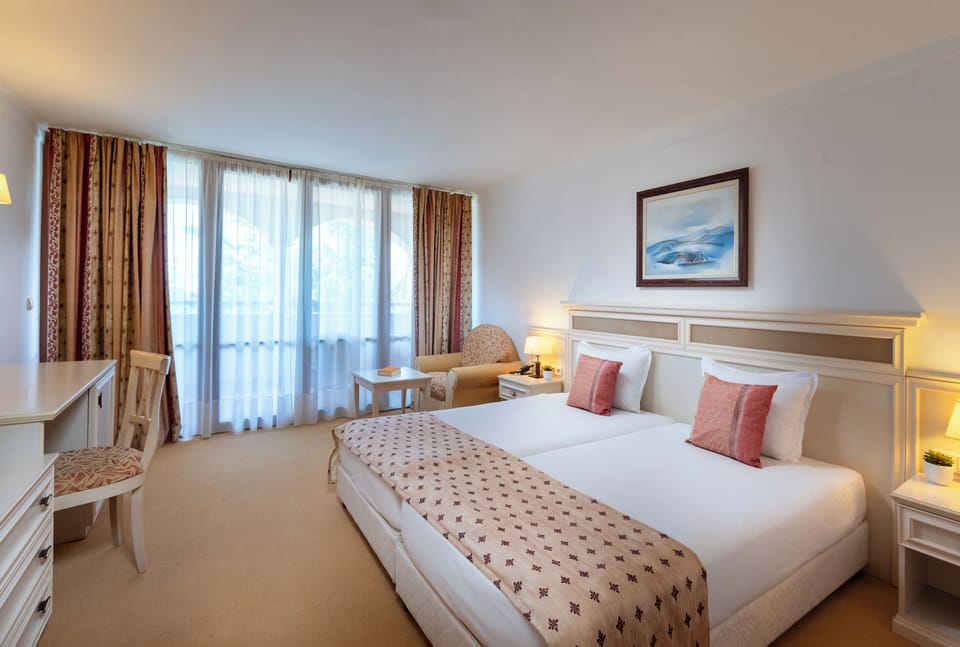 Duplex Suite, Sea View | Minibar, in-room safe, desk, blackout drapes