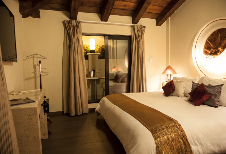 Premium bedding, down comforters, pillowtop beds, in-room safe