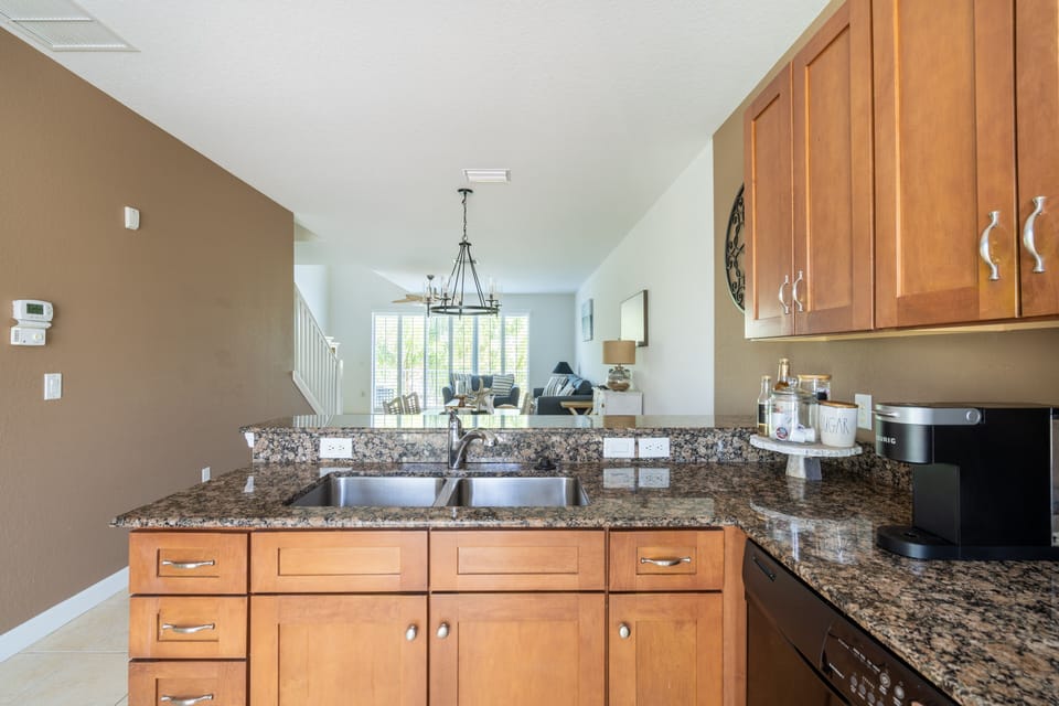 Kitchen opens to the dining and living room.