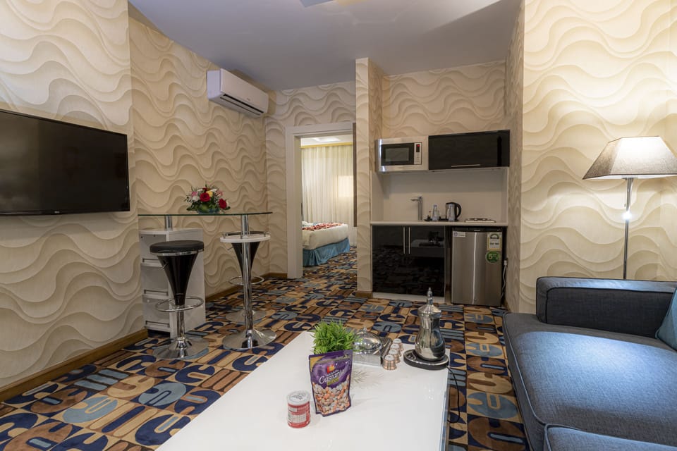 Suite, 1 Bedroom, Connecting Rooms | Living area | Flat-screen TV