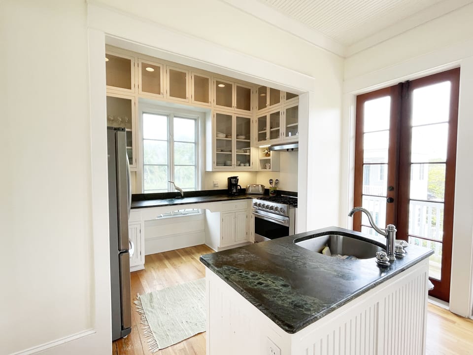 ADJACENT TO LIVING AREA, OPEN KITCHEN