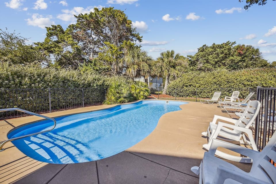 Take an evening swim after a fun day at the beach.