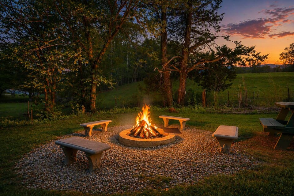 The firepit comes alive at night with a beautiful, cozy glow—ideal for stargazing and late‑night conversations