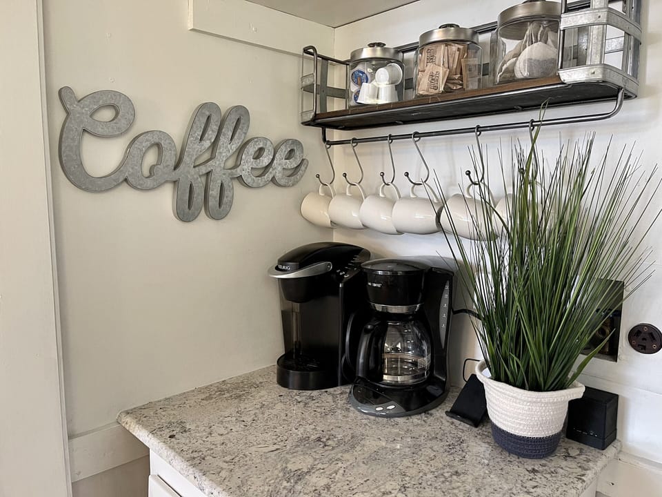 Coffee nook for guests complete with coffee tea and sugar