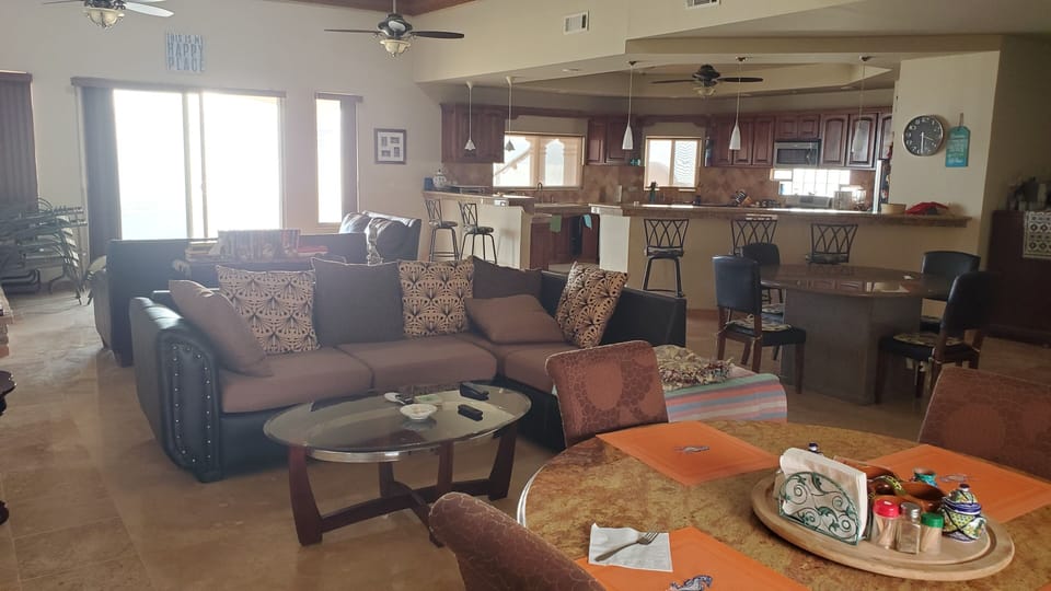 Open concept living opens to courtyard and beach patios