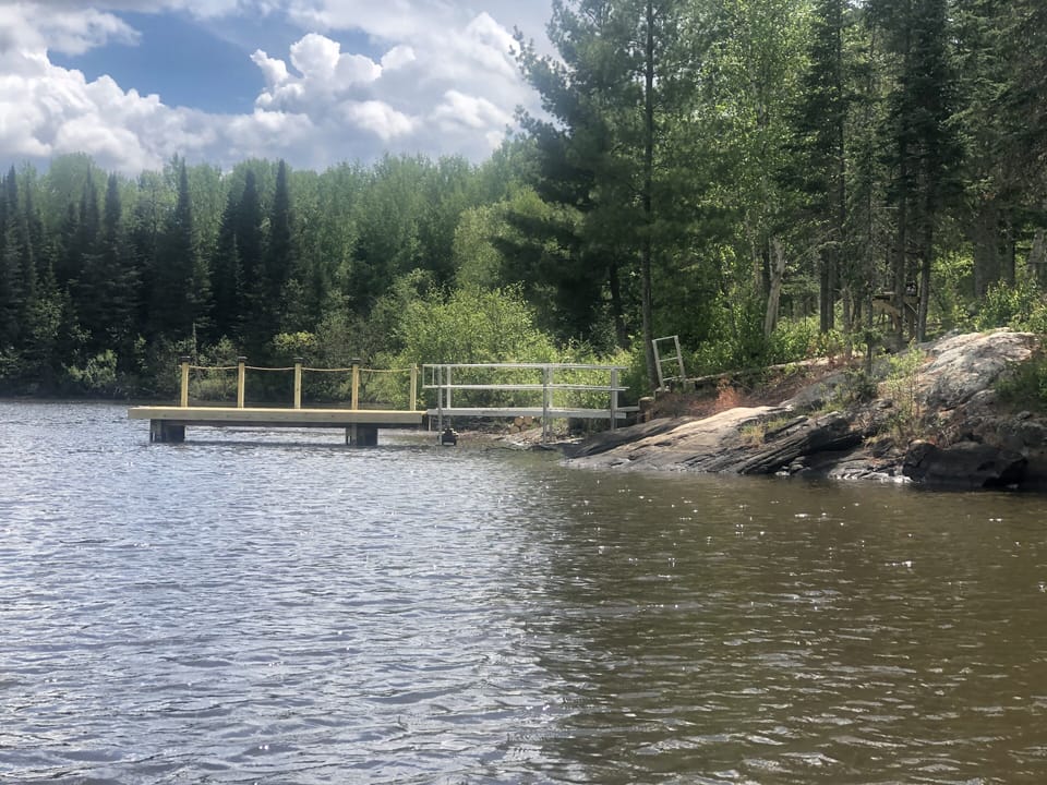 New dock installed. Holds a 20 foot boat.