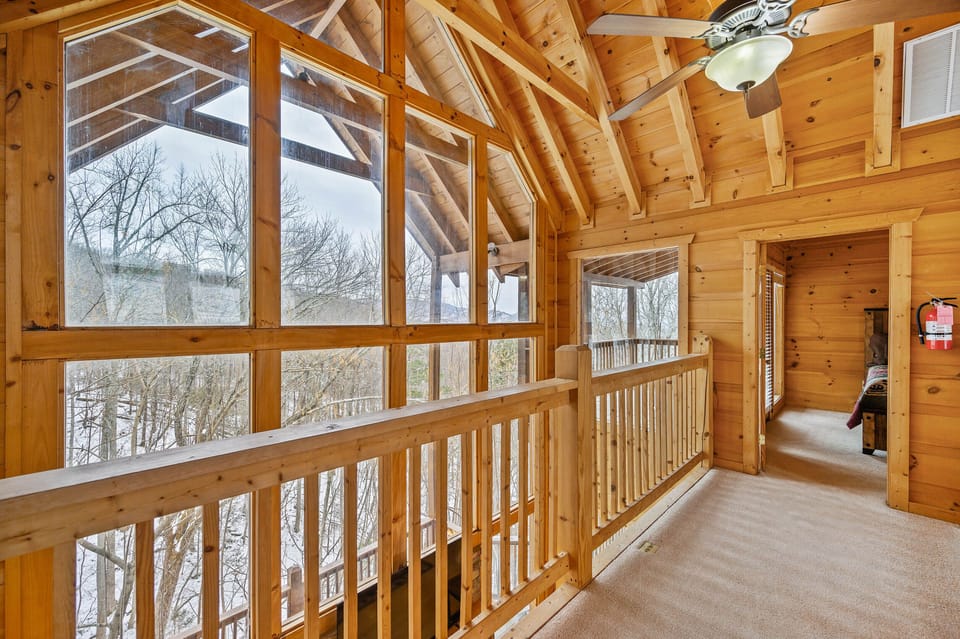 Unique bridge connects the two bedrooms on the upper floor