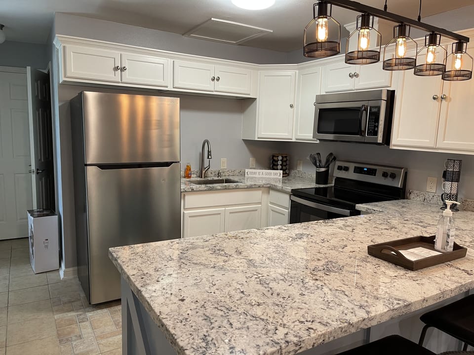 spacious Kitchen, with granite counter top.