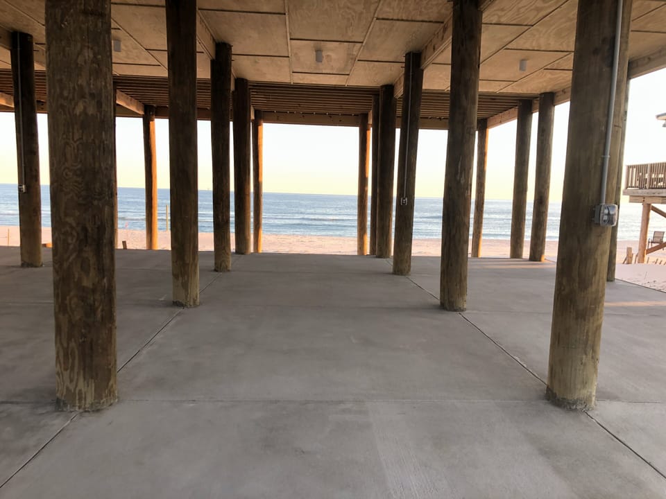 Concrete parking under the house for 4 vehicles 