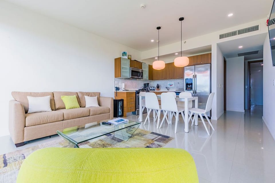 Living room, dining, and kitchen area