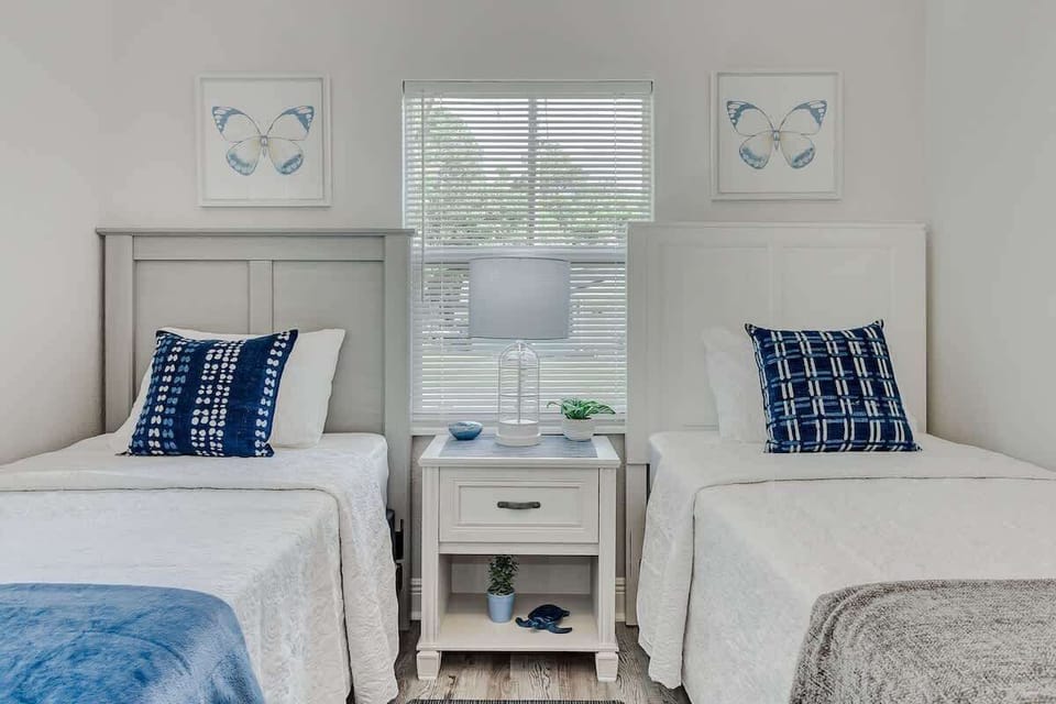 Discover our twin-bed retreat—a symphony of comfort. Each mattress cradles you, and the linens cocoon you in softness. Whether it’s a sibling sleepover or a best-friend getaway, this room whispers ‘bond, dream, repeat.
