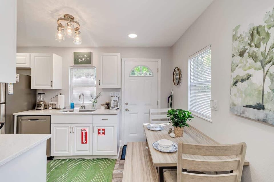 Our eat-in kitchen is bathed in natural light, creating a cheerful and inviting atmosphere. 