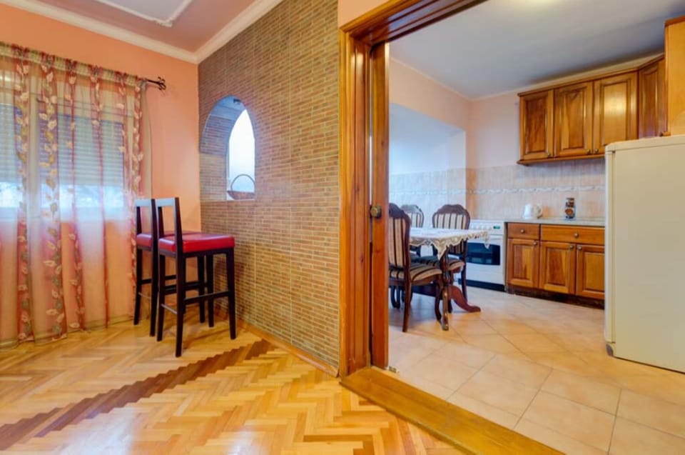The kitchen is fully equipped for cooking and has basic ulitities